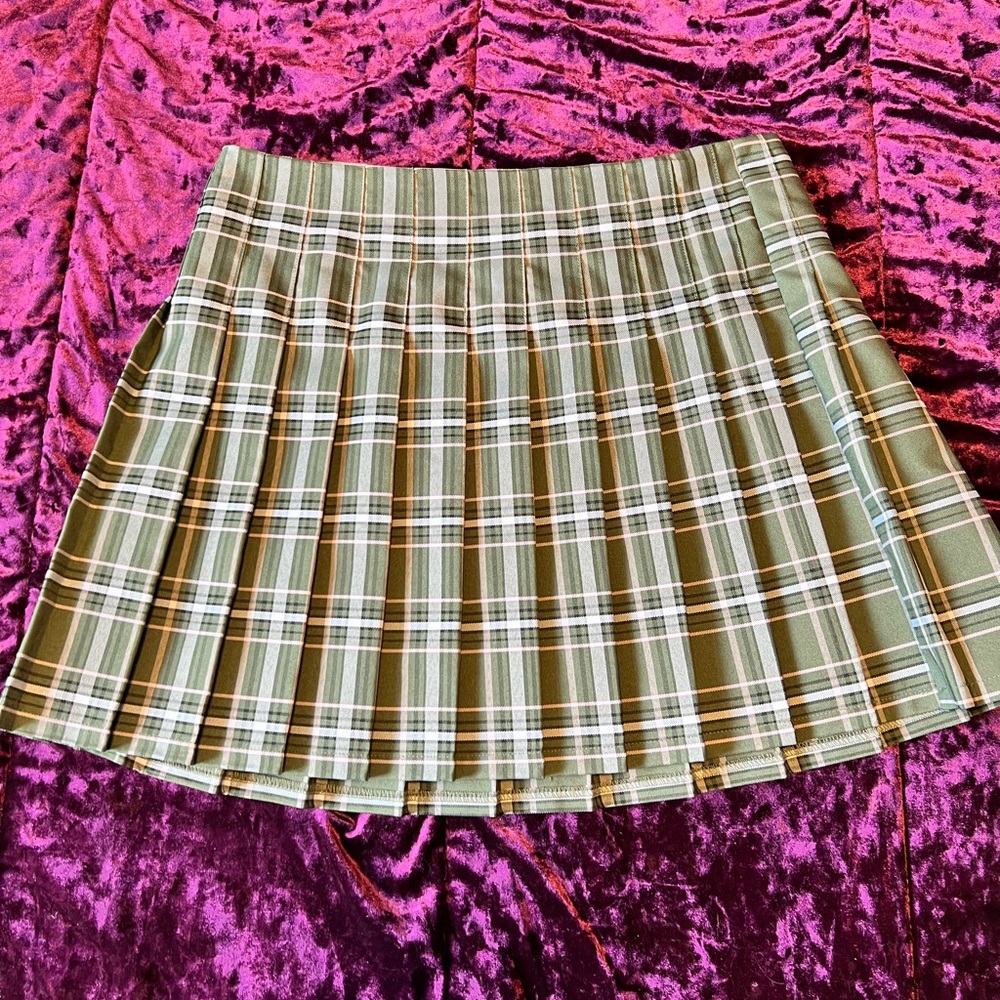Olive green pleated mini skirt